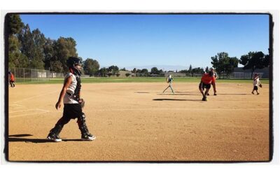 Nene heads back to the dugout. NOR softball Angels playing tonight. #socal #bakersfield #softballdad