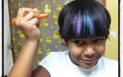 Applying hair chalk in the bathroom. #dadlife #socal