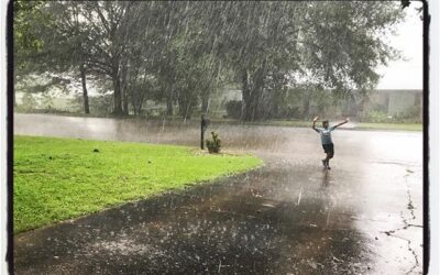 Cali gurl getting her rain storm on. #olemiss #proflife #dadlife