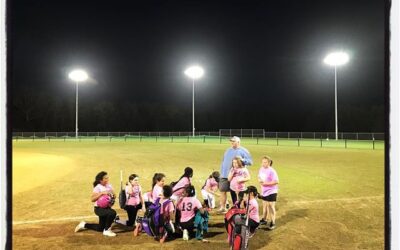 Take a knee ladies. OPC Pink Bombers listen to their coach talk about their 14-7 win Tuesday night. #prouddad #softball #batlikeagirl