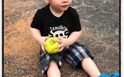 Junior softball fan. #dadlife