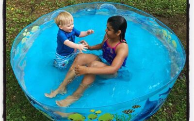 Brother and sister time in the back yard pool. #dadlife