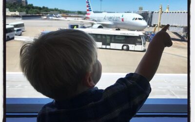 Chai pointing out planes and trucks (gucks) at DCA. #dadlife #fagansreunion2018