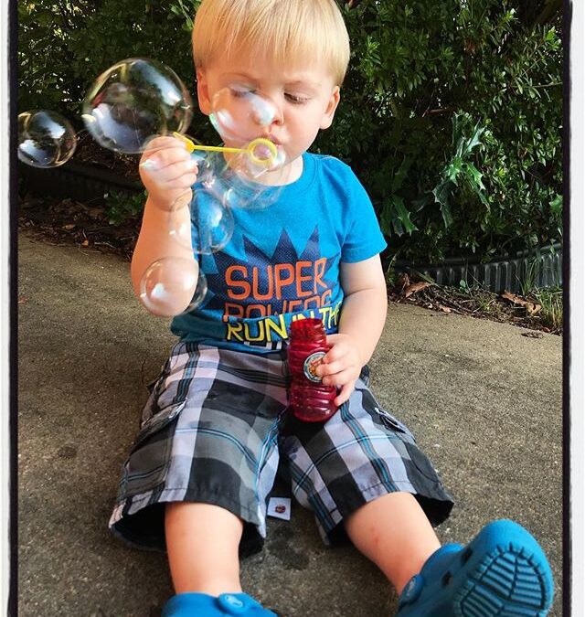 Blowing bubbles in the front yard. #dadlife #kalish2018 #bubbles