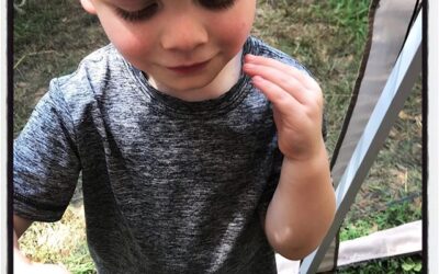 Chai getting close and personal with a monarch butterfly @strawberryplains #dadlife #mississippijourno