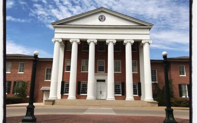 The Lyceum flanked by light posts. #mississippijourno #postcardsfromcovid19